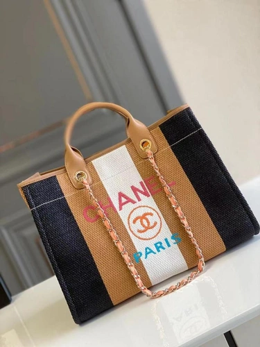 Женская сумка-шоппер Chanel из соломки в полоску 35/30 см фото-7