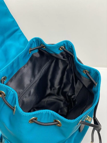Женский рюкзак Coach тканевый ярко-синий с откидным клапаном 25/30/13 см фото-2