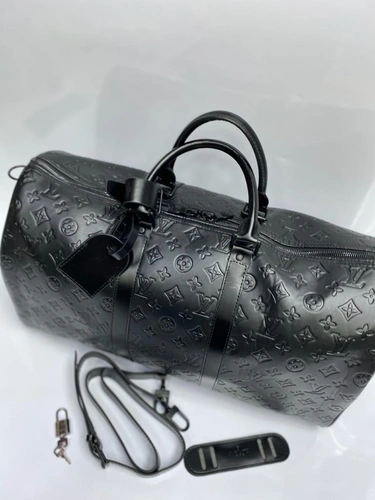 Дорожная сумка Louis Vuitton из тисненой канвы черная 50/28/22 см фото-5
