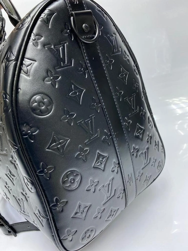Дорожная сумка Louis Vuitton из тисненой канвы черная 50/28/22 см фото-3