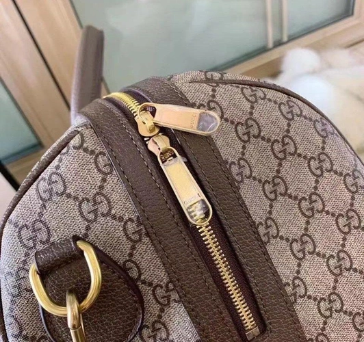 Дорожная сумка Gucci серая с рисунком-монограммой 45/28 см фото-4