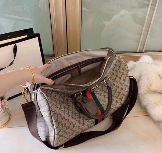 Дорожная сумка Gucci серая с рисунком-монограммой 45/28 см фото-2