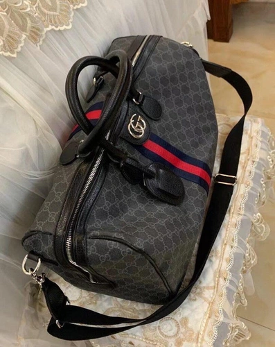 Дорожная сумка Gucci чёрно-серая с рисунком-монограммой 45/28 см