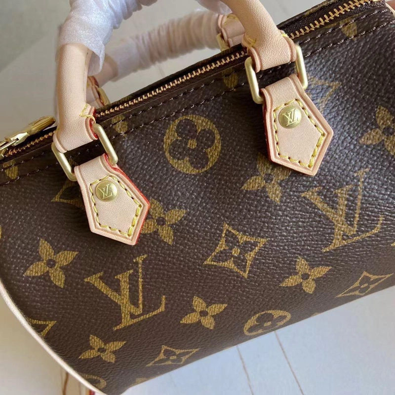 Женская мини-сумочка Louis Vuitton из канвы коричневая 16/13 см фото-6