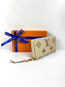 Кошелёк женский Louis Vuitton Zippy кремовый из тиснёной мягкой кожи Monogram Empreinte премиум-люкс 19/10/2,5 см фото-