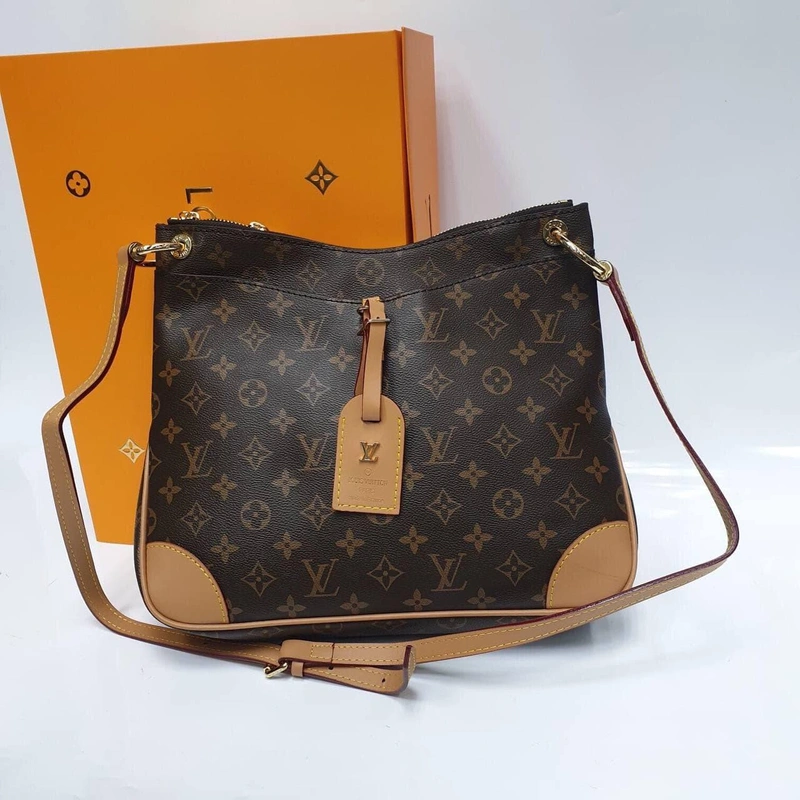 Женская сумка Louis Vuitton коричневая 32/27/8