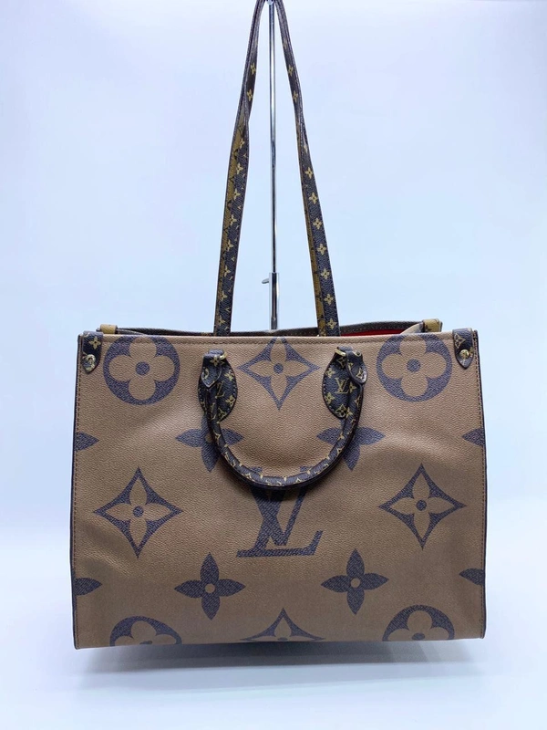 Женская сумка Louis Vuitton коричневая