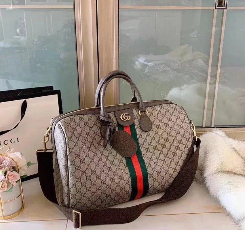 Дорожная сумка Gucci серая с рисунком-монограммой 45/28 см